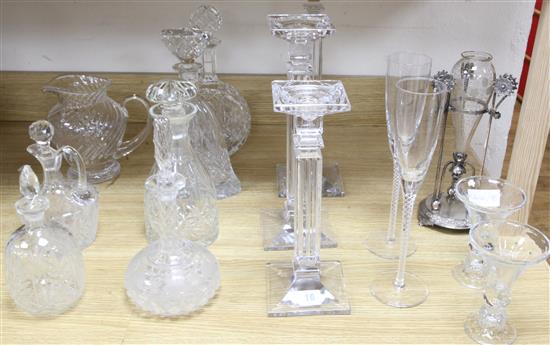 Three graduated glass candlesticks and an epergne, candlesticks 41cm